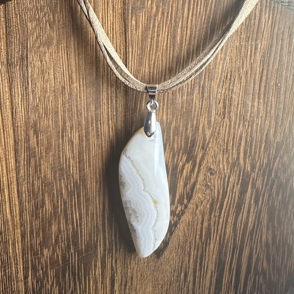 White Banded Ocean Jasper S Shape Pendant Necklace on Tan Rope